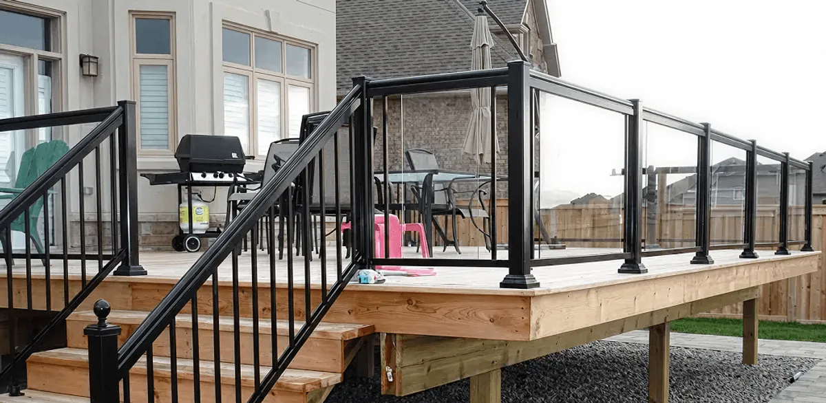 Handrail installation on a deck staircase for safety and code compliance in Columbia, MO